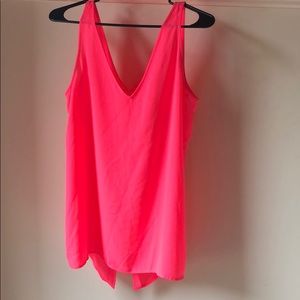 Hot pink sleeveless shirt. Open back. Never worn.